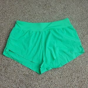 Green exercise shorts
